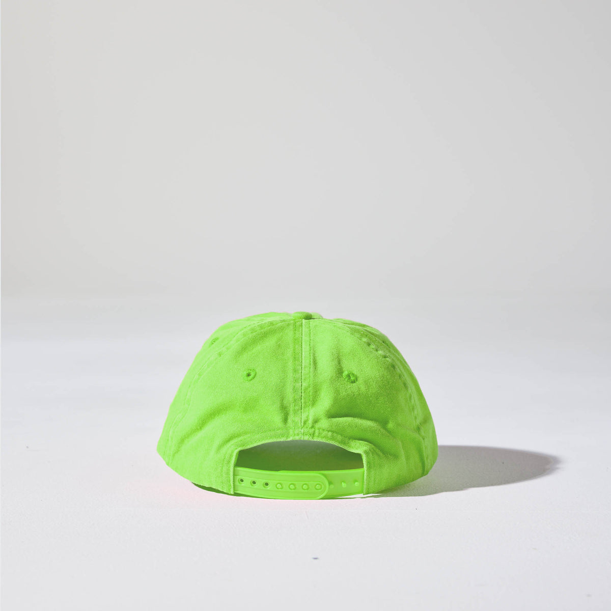 A lime green coloured, 6-panel unstructured 'Dad' baseball cap made of recycled cotton twill with snap back by House of Peaks. Australian Hats
