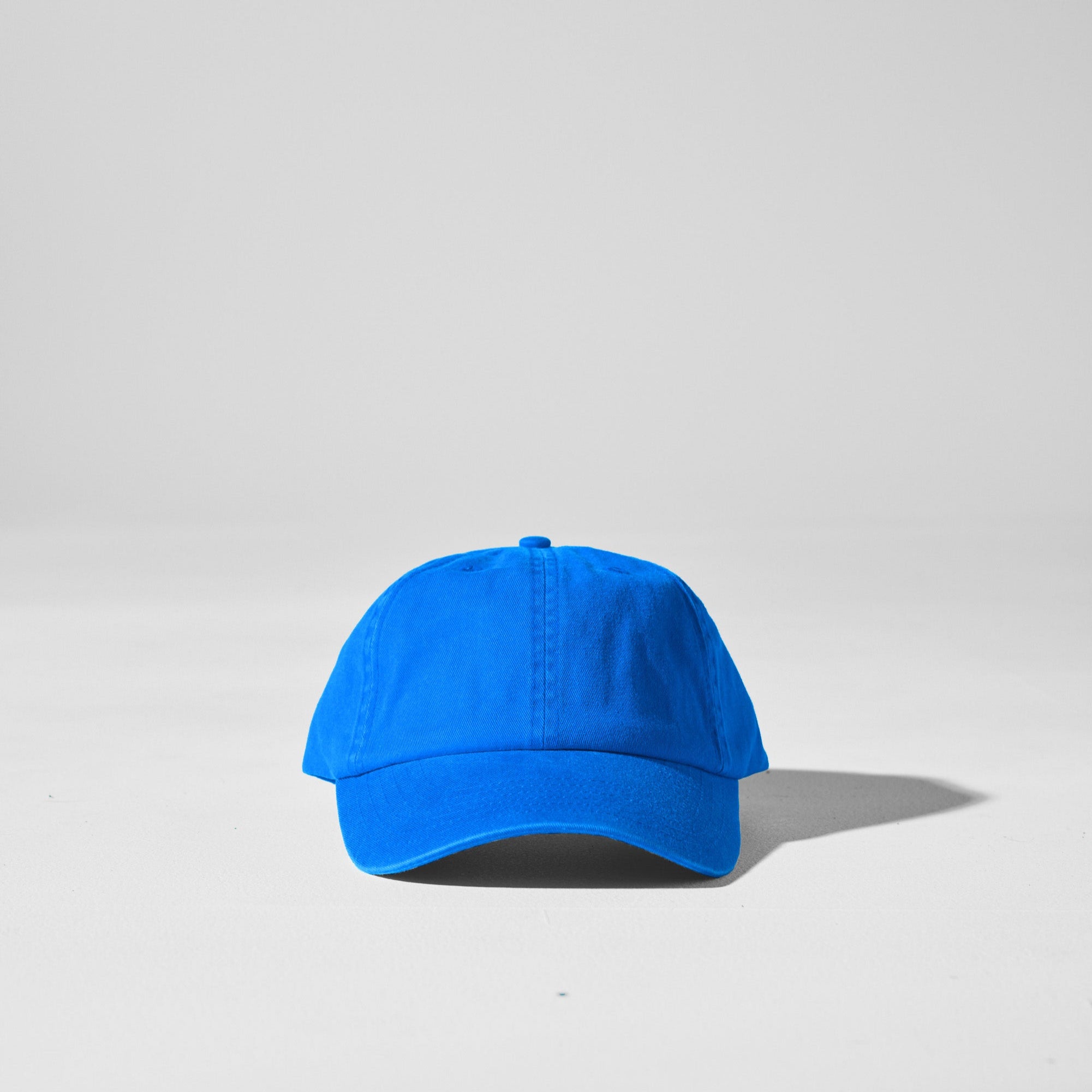 Blue cap on a light gray background
