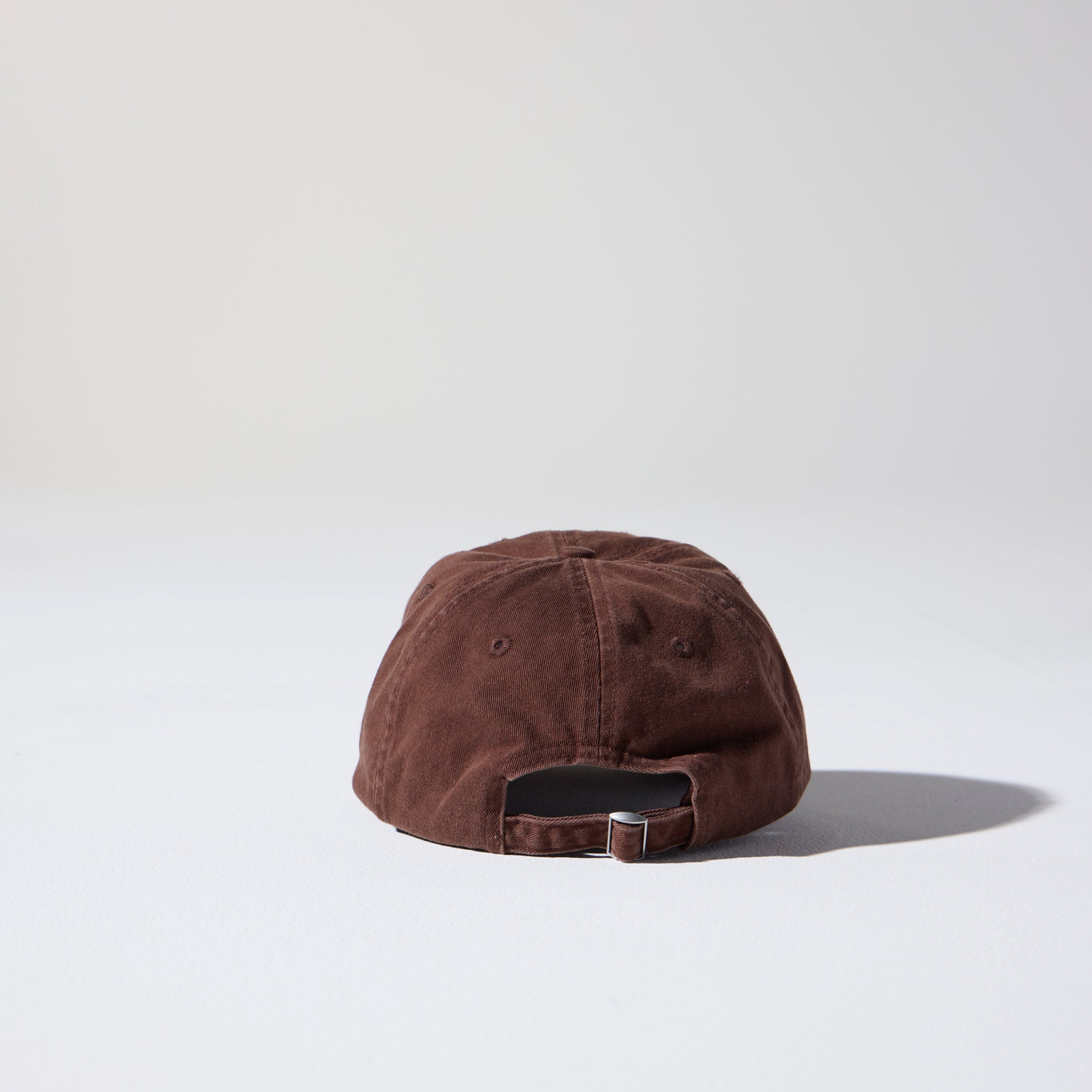 Brown cap on a white background