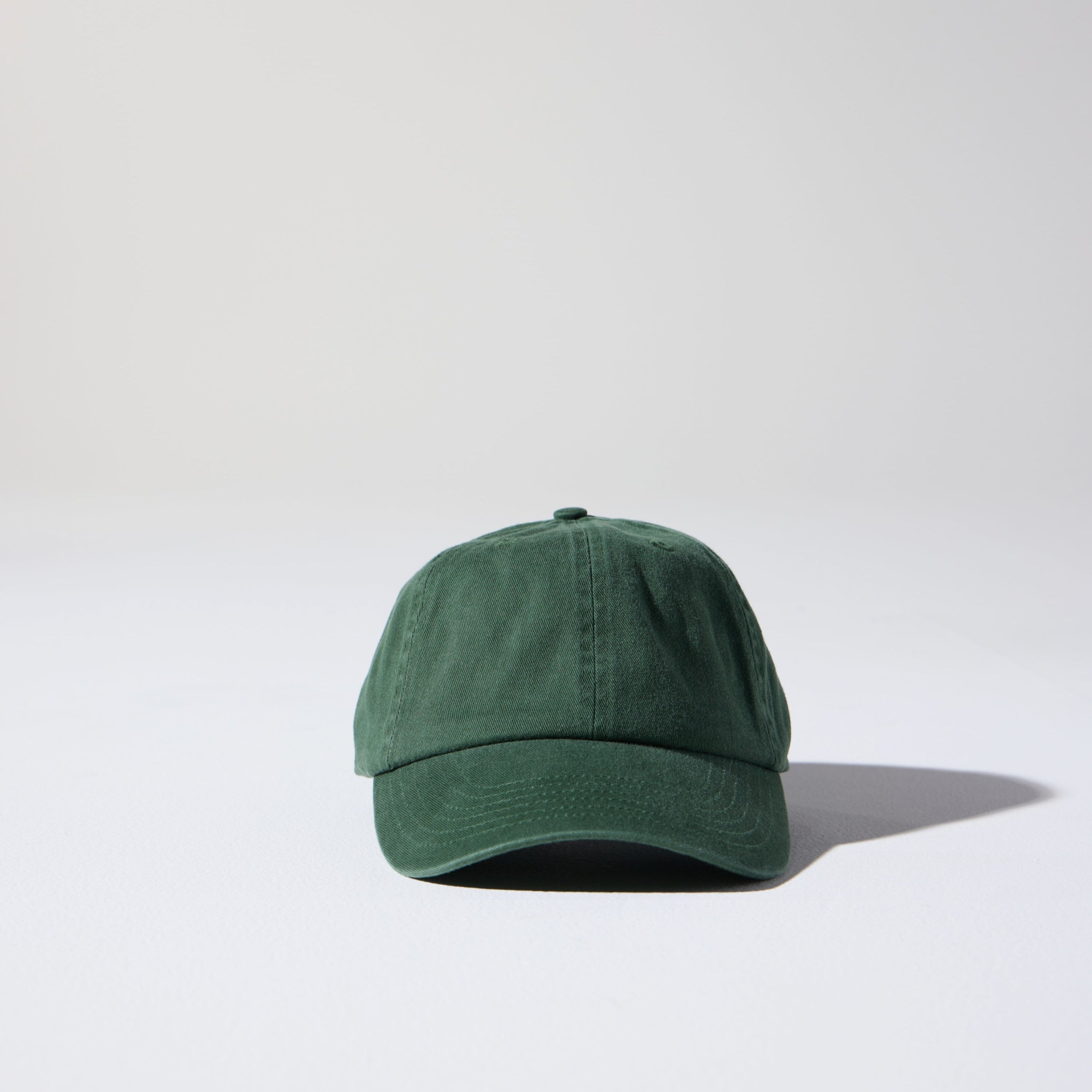 Green cap on a white background