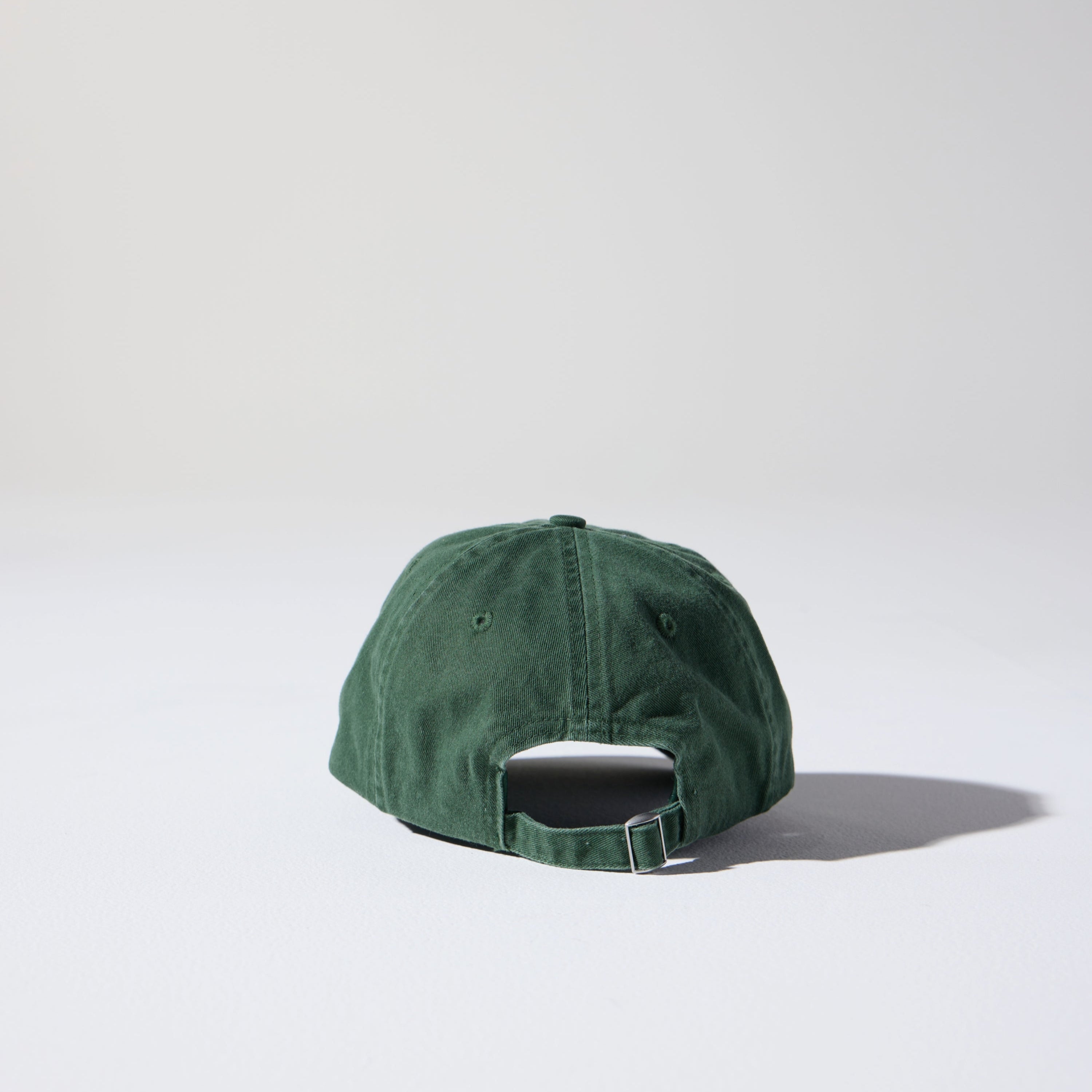 Green cap on a white background