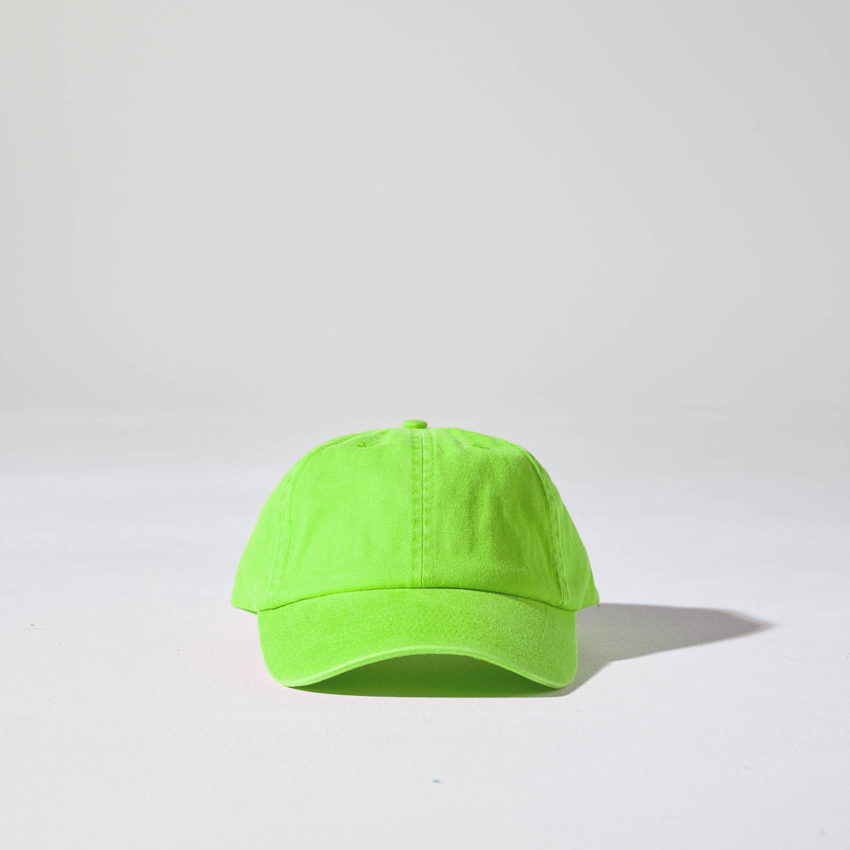 A lime green coloured, 6-panel unstructured 'Dad' baseball cap made of recycled cotton twill with snap back by House of Peaks. Australian Hats