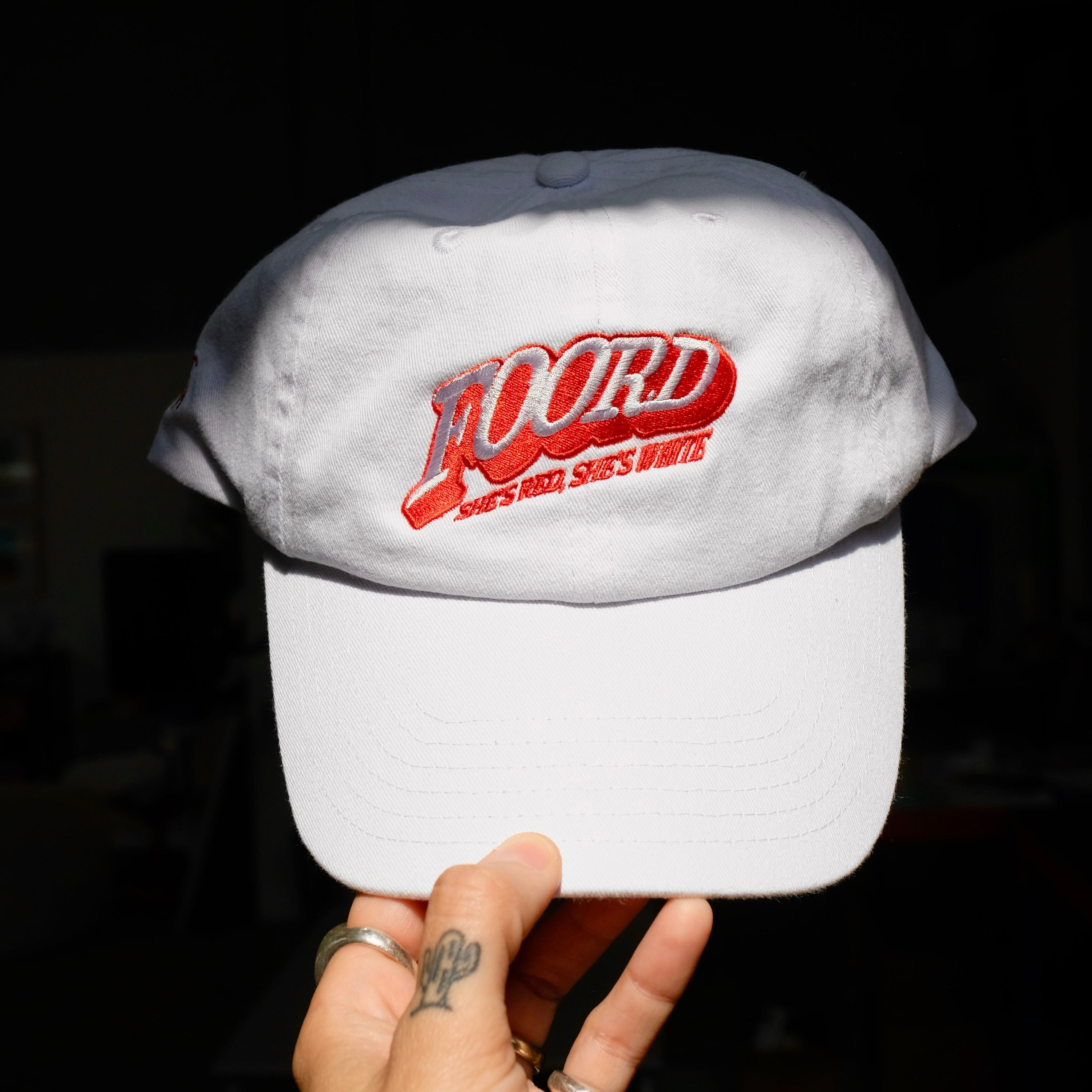 White cap with foord on it