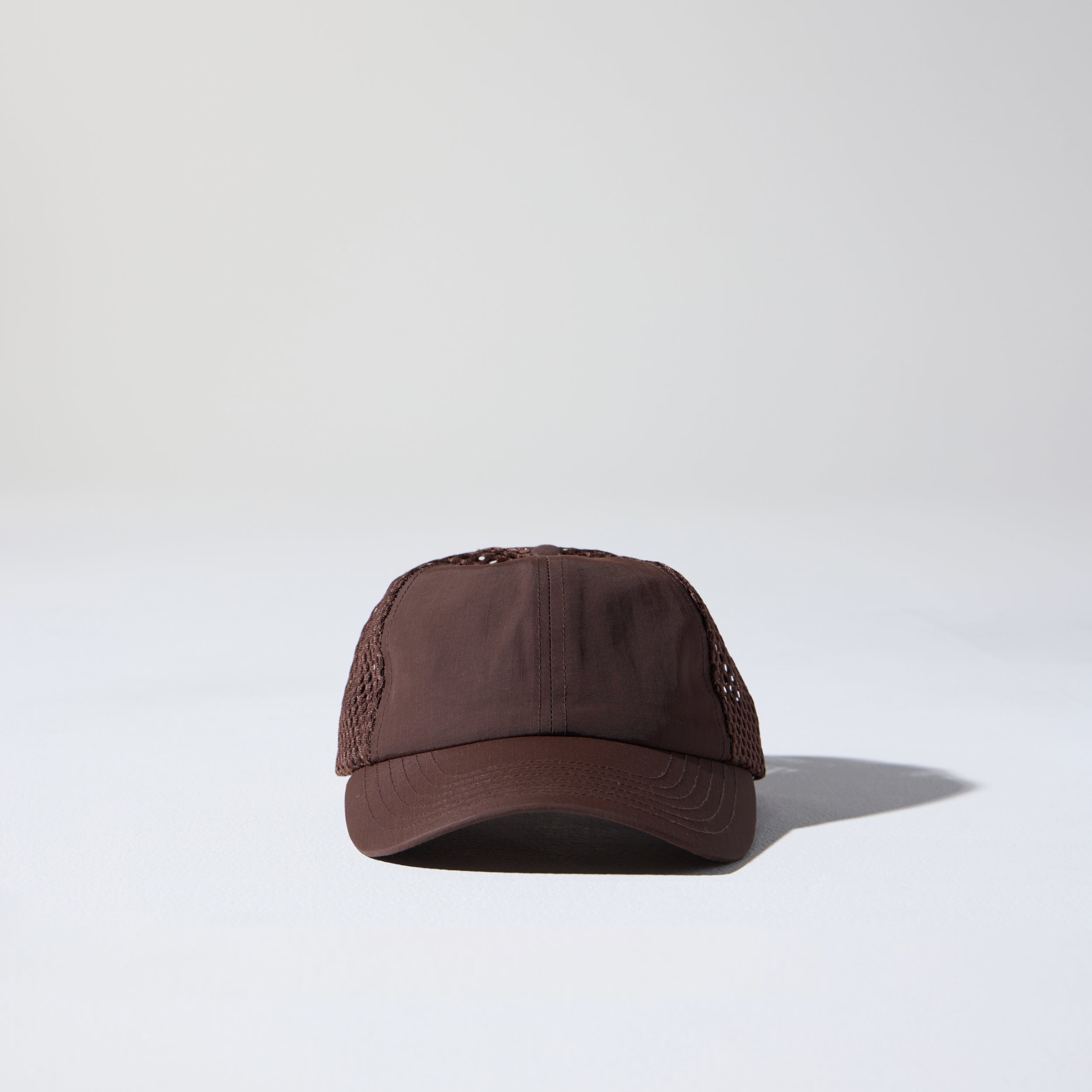 Friday Mesh Cap in Cacao Brown by House of Peaks – recycled nylon running hat with breathable mesh and bungee cord.