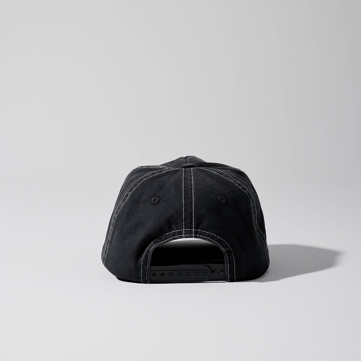 Short Peak Full Curve 5 panel cap. Structured Curved Peak. Black with contrast white stitching. Baseball cap. Australian hats. Snap back